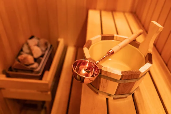 Finnish wooden Sauna small private room with traditional accessories