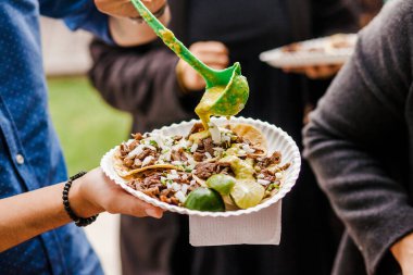 Mexican Tacos al Pastor in Mexico city clipart