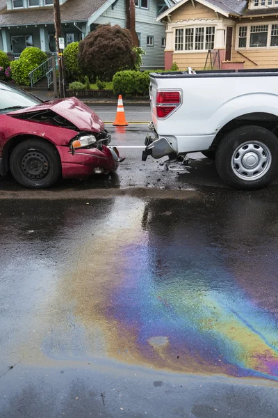 Iridescent oil spill caused by a traffic accident — Stock Photo, Image