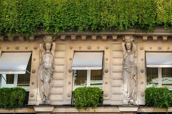Parisian apartment building with flower boxes — Stock Photo, Image