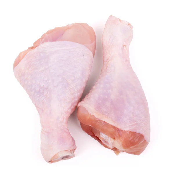 Two raw chicken drumsticks isolated on white background Stock Photo