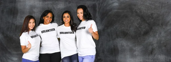 Skupina dobrovolníků, ženy — Stock fotografie