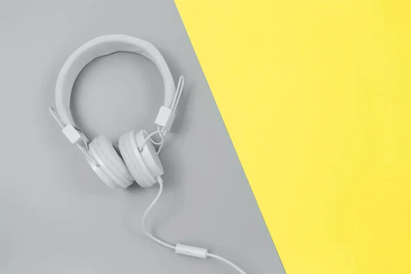 Gray Headphones Trendy Yellow Gray Background Music Concept Toned Image — Stock Photo, Image
