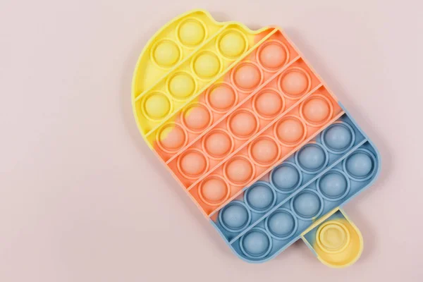 Beliebtes Silikon Pastell Stress Spielzeug Für Ein Kind Auf Rosa — Stockfoto