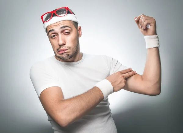 Crazy man testen van de slappe spieren onder haar arm — Stockfoto