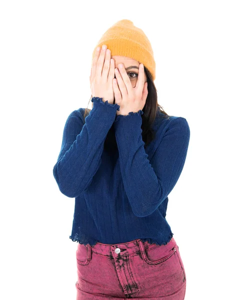 Guilty. Close up young woman covering face with hands. Shame, isolated on white background. Ashamed girl. Studio shot