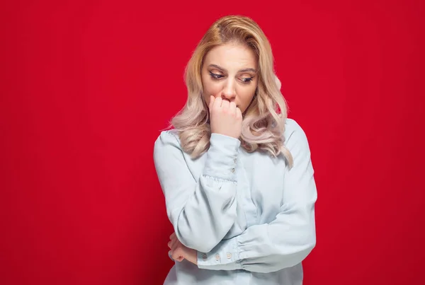 Worried Young Woman Hold Her Hand Mouth Looking Isolated Red — Stock Photo, Image