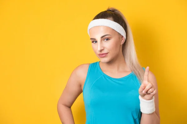 Young Vitality Woman Sport Clothing Pointing Forefinger Copy Space Blank — Stock Photo, Image