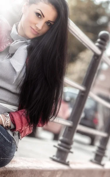 Portrait of attractive woman with long black hair posing — Stock Photo, Image