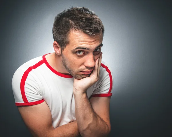 Confused young man — Stock Photo, Image