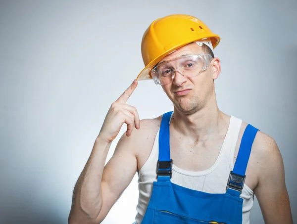 Bored young builder — Stock Photo, Image