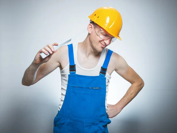 Bored young builder — Stock Photo, Image