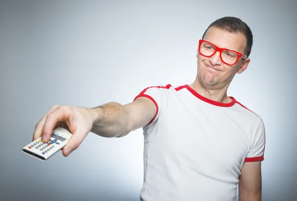 Funny man with remote control — Stock Photo, Image