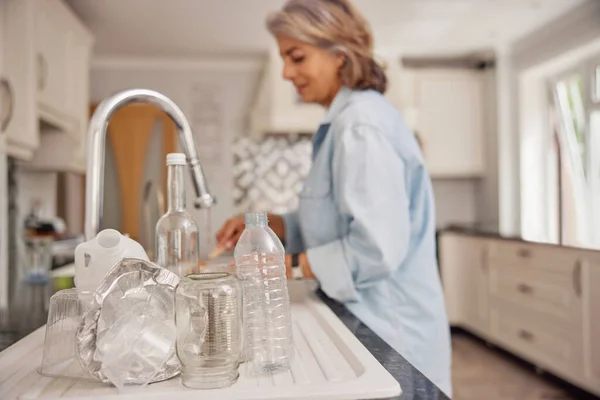 Mature Woman Home Kitchen Washing Used Packaging Recycling — Stock Photo, Image