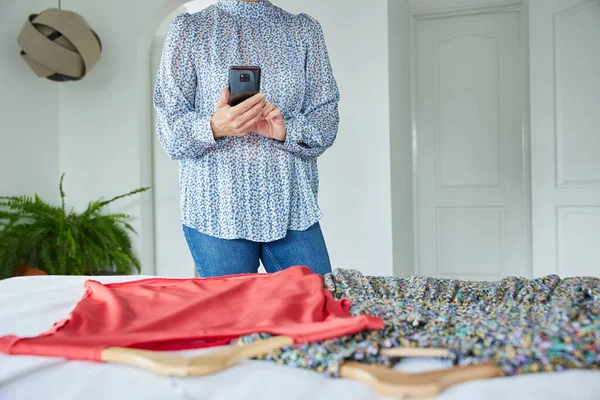 Close Woman Photographing Unwanted Clothes Mobile Phone Sell Online — Stock Photo, Image