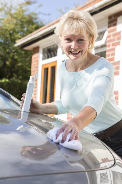 Portrait Of Senior Woman Polishing Car — Stock Photo, Image