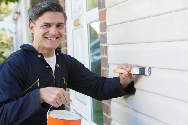 Man Holding Brush And Tin Painting Outside Of House — Stock Photo, Image