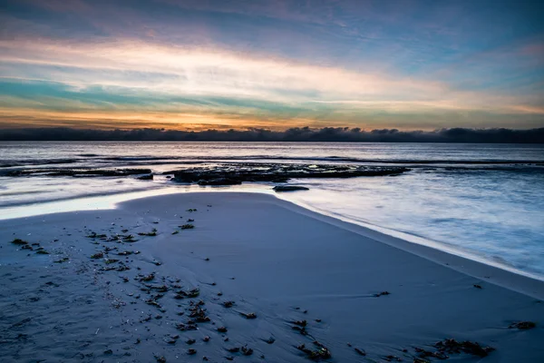 Puesta de sol en la playa de Torrevieja . — Foto de Stock