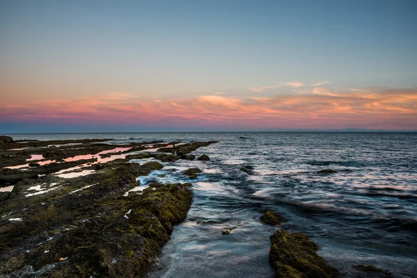 Paisaje al atardecer en costa española — Foto de Stock