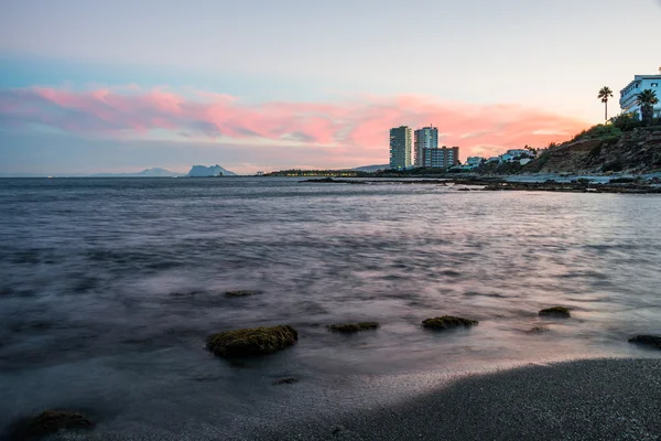 Paisaje al atardecer en costa española — Foto de Stock