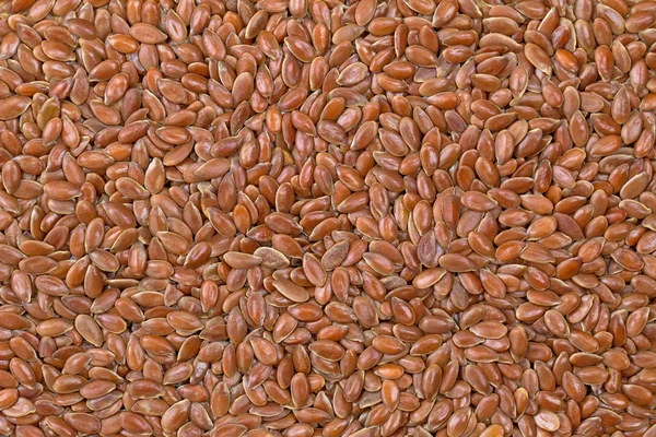 纹理带红色棕色种子的亚麻籽，也被称为亚麻籽的照片 — 图库照片