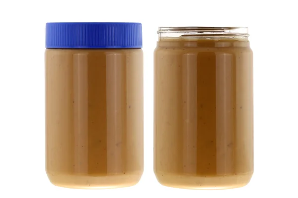 Manteiga de amendoim crocante cremosa isolada em branco — Fotografia de Stock