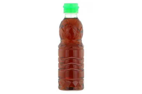 A plastic bottle full of Thai Fish sauce — Stock Photo, Image