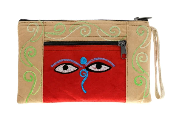 Beige bag with symbol Nepali Buddha Eyes — Stock Photo, Image