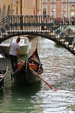 Gondoliers and Gondolas on Venetian canals in Venice, Italy