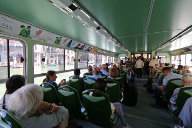 Inside the public water taxi or water bus (Vaporetto) in Venice, Italy