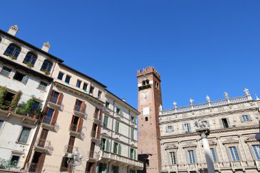 Gardello Tower and the facade of Palazzo Maffei in Verona, Italy