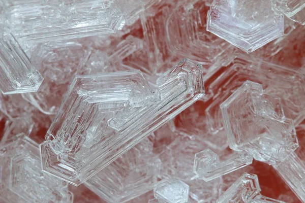 Macro foto de cristales de hielo sobre fondo naranja — Foto de Stock