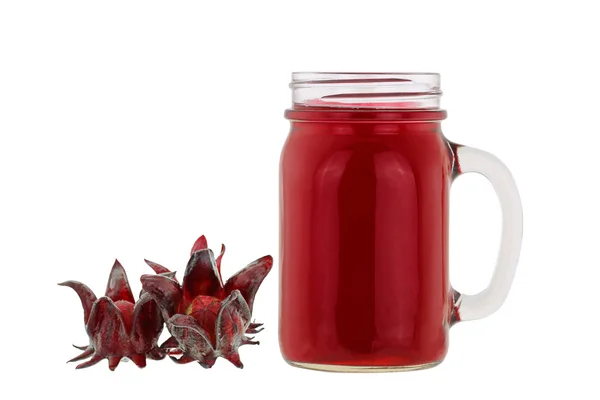 Flores frescas de Roselle y un vaso de té de hierbas de Roselle — Foto de Stock