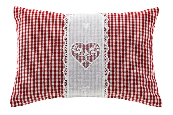 Red gingham pillow with flake of Swiss stone pine inside — Stock Photo, Image