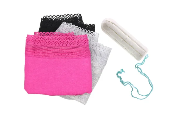 Pembe, gri, siyah renk beyaz kullanılmayan Tampon yanında iç çamaşırı — Stok fotoğraf