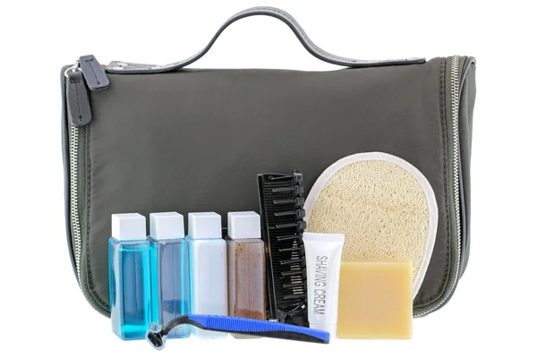 Black traveling cosmetic bag with toiletries, isolated on white — Stock Photo, Image