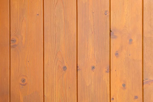 Pared de madera oscura en color marrón amarillo con patrón de madera natural —  Fotos de Stock