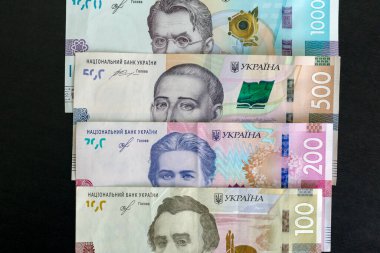 Ukrayna 'nın parası bin beş yüz iki yüz hryvniadır. Ulusal para birimi. Ukrayna 'da yolsuzluk. Girişim sermaye yatırımı, finans, tasarruf, banka ve insan konsepti. Kapat.