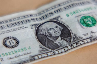 USA dollar on craft background: one currency banknote. Inflation, business, economics and finance theme.
