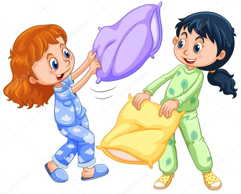 Two girls playing pillow fight at slumber party