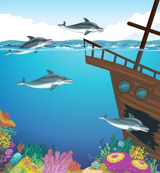 Delfini che nuotano sotto il mare — Vettoriale Stock