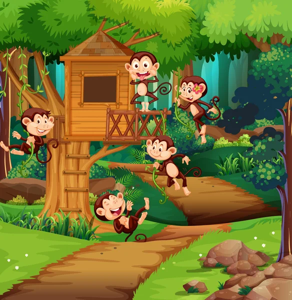 猴子在树屋玩游戏 — 图库矢量图片