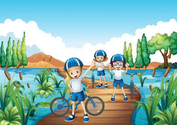 Tres niños montando bicicleta sobre el puente — Vector de stock