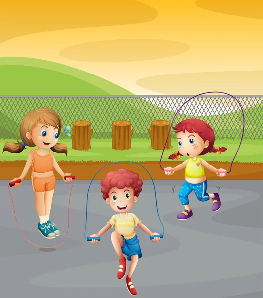 Three kids jumping rope in the park — Stock Vector