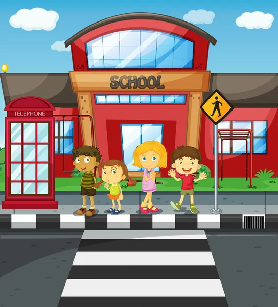 Niños esperando para cruzar la calle frente a la escuela — Vector de stock