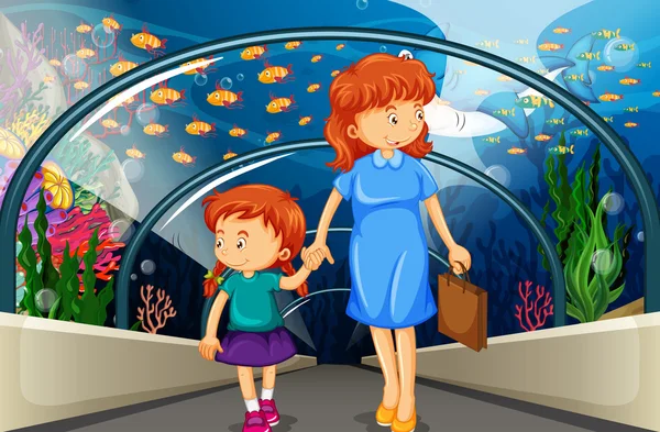 Mor och barn på aquarium — Stock vektor