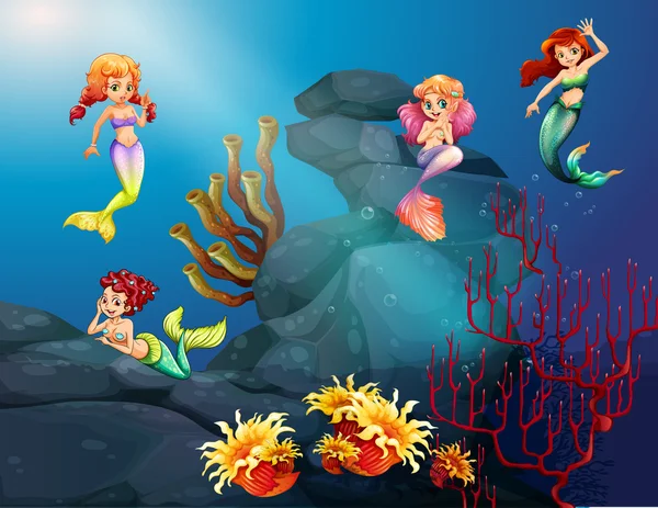 Sirènes nageant sous l'océan — Image vectorielle