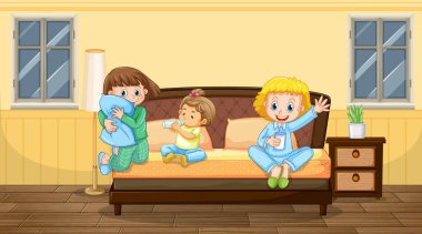 Pijamalı üç çocuğun olduğu yatak odası sahnesi.