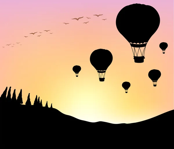 Silhouette balloons in the sky — Stock Vector