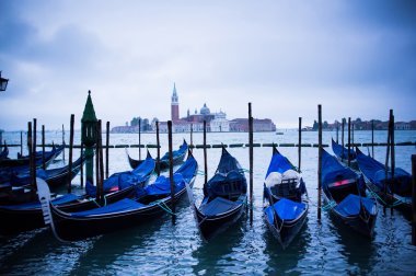 Wooden gondolas at St Marco Square